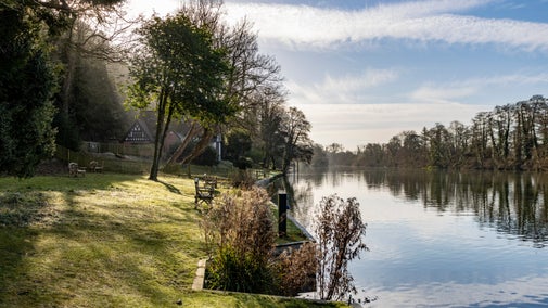 A view along the River Thames in Buckinghamshire with Spring Cottage in the background